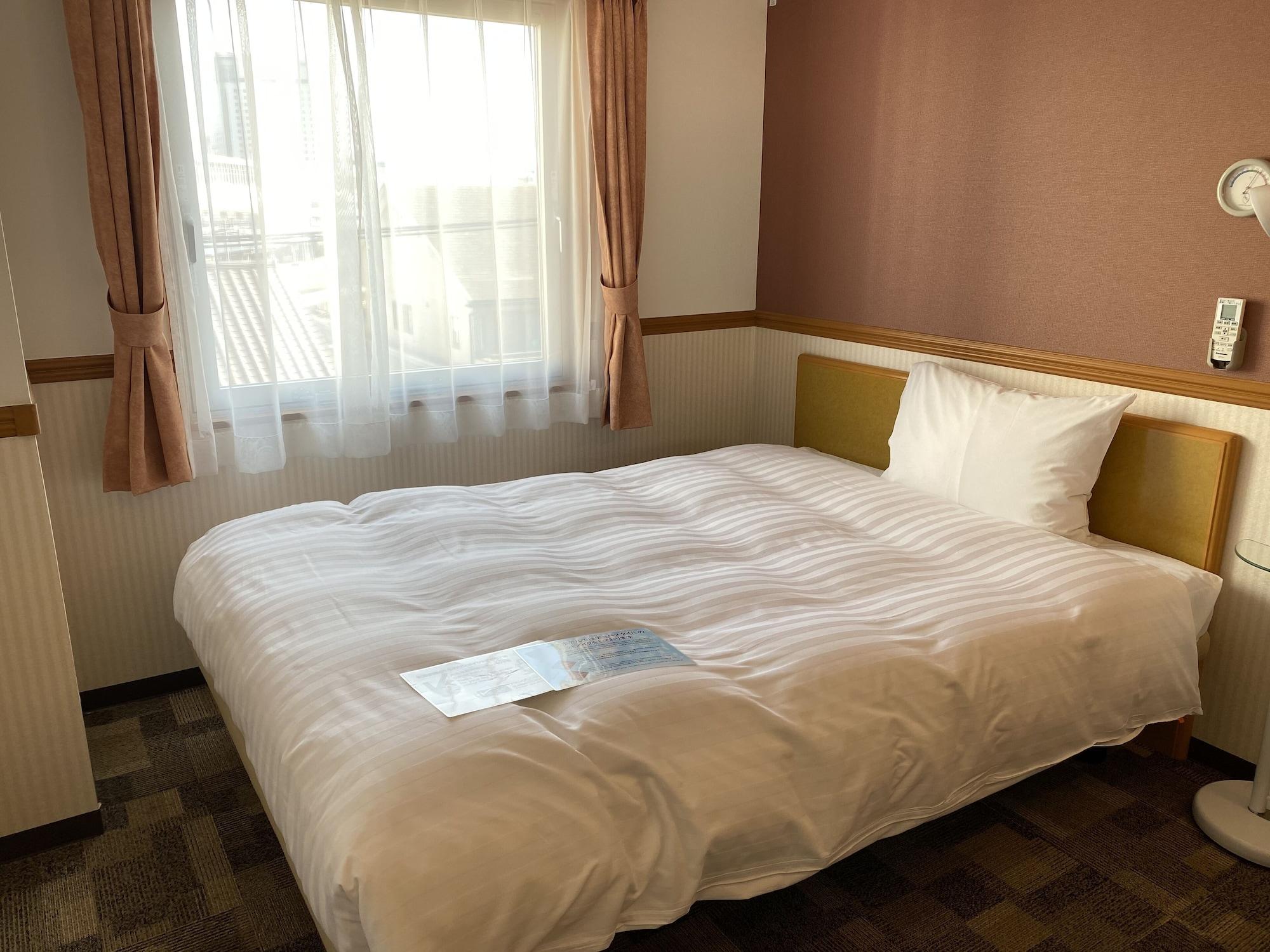 Toyoko Inn Okayama Eki Nishi Guchi Migi Exterior foto